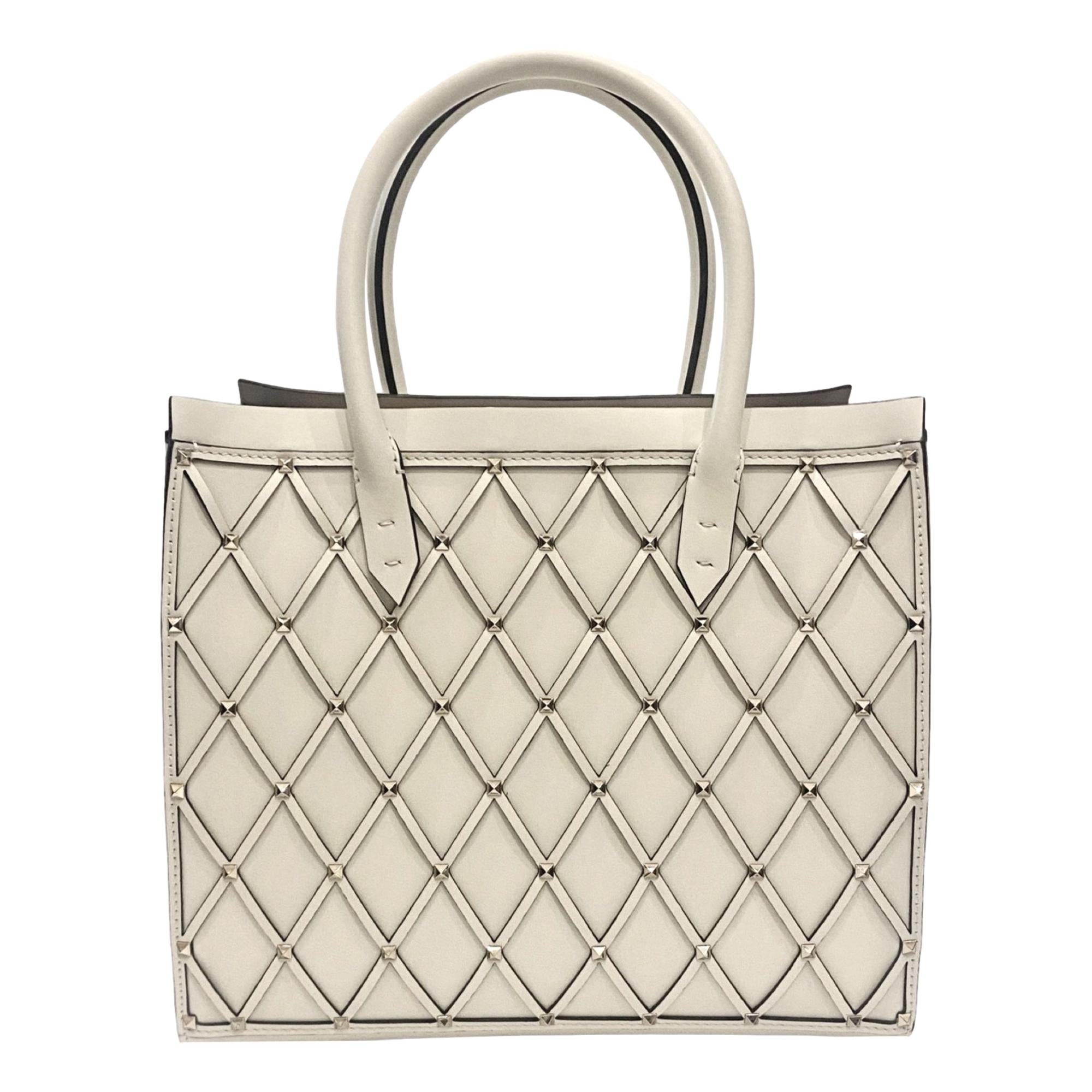 valentino-garavani-beehive-lattice-ivory-studded-leather-crossbody-tote-bag-39697986715864_2000x2000